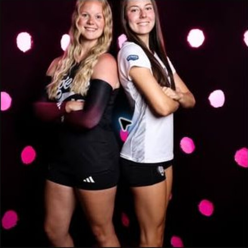 Maddie Hawley and Libby Erwin in volleyball uniforms