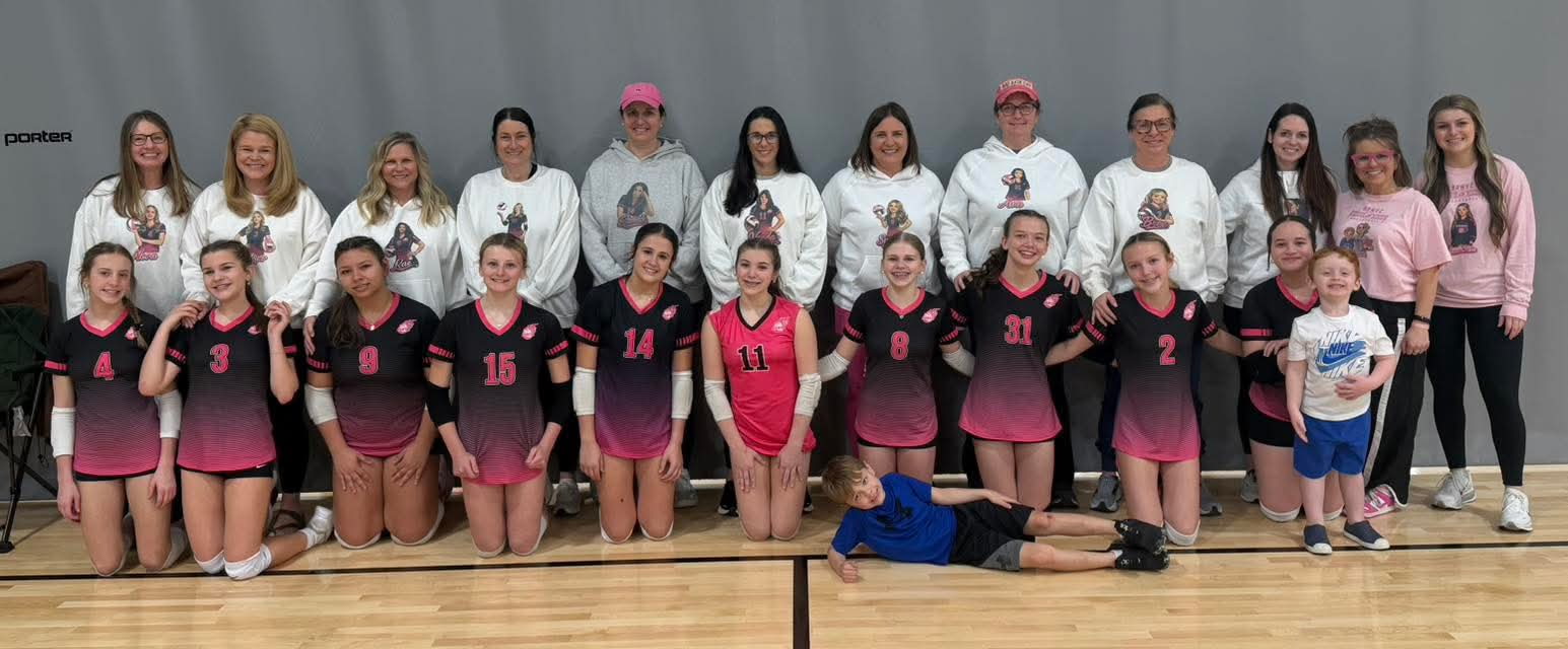 BAMVC players, coaches, and family supporters together in the gym